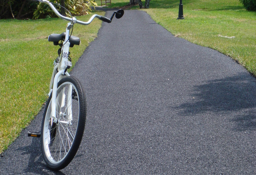 bike parked on porous rubber trail